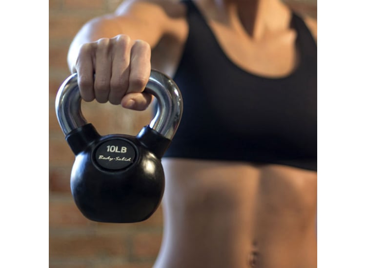 Woman Using Body-Solid- Kettlebell for Workout