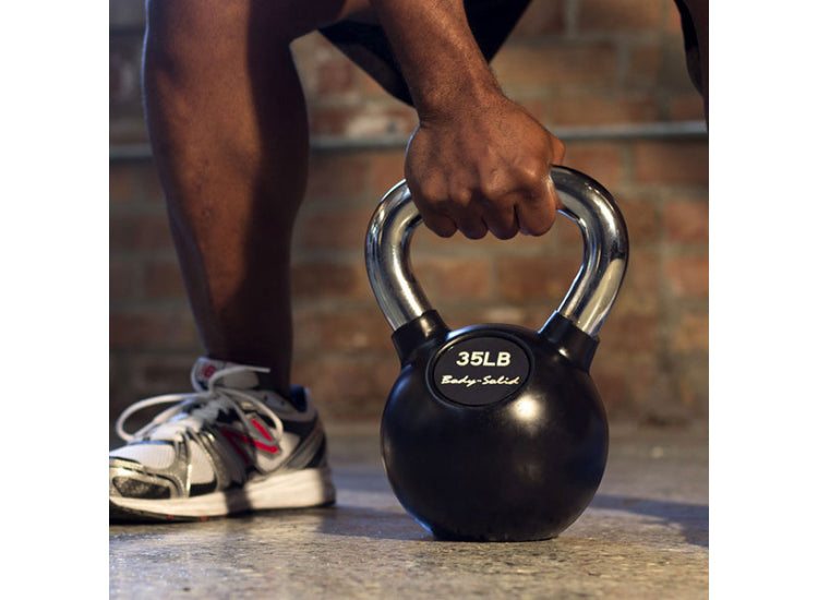 Man Using Body-Solid- Kettlebell for Workout